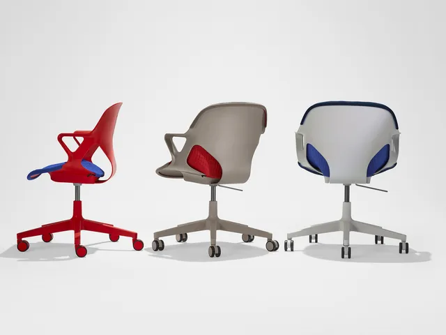 Three Herman Miller Zeph office chairs in different colors