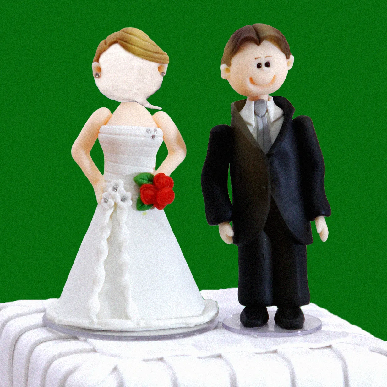 Image may contain Figurine Cake Dessert Food Baby Person Adult Wedding Face Head Birthday Cake and Cream