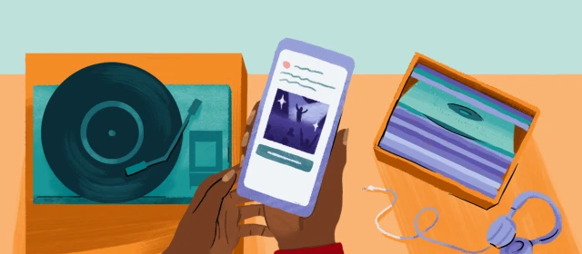 A turntable, a laptop, headphones, and a pair of hands holding a phone that shows an ad for a music festival.